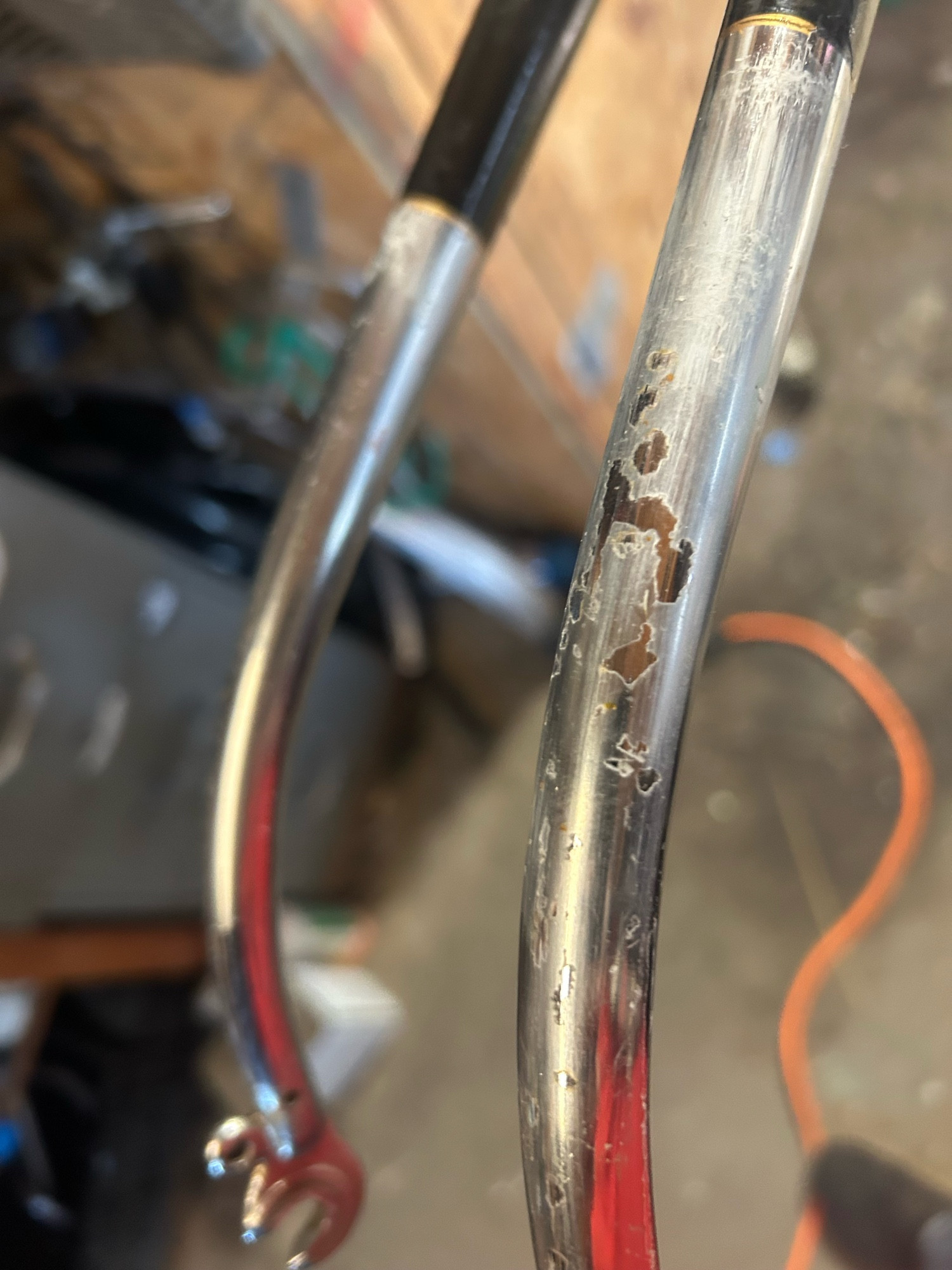 Chrome fork blades with flaking varnish