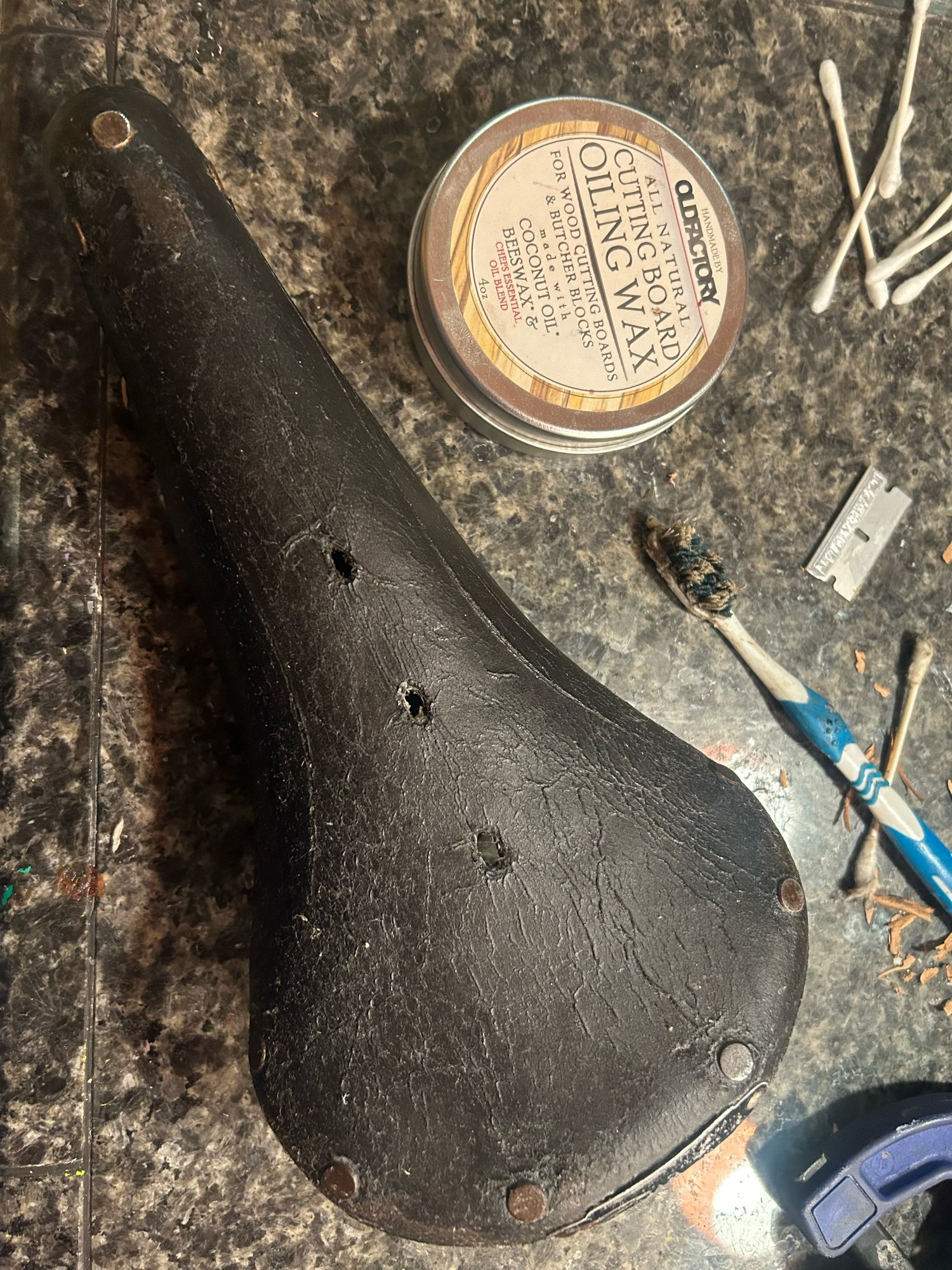 Reconditioning the saddle leather