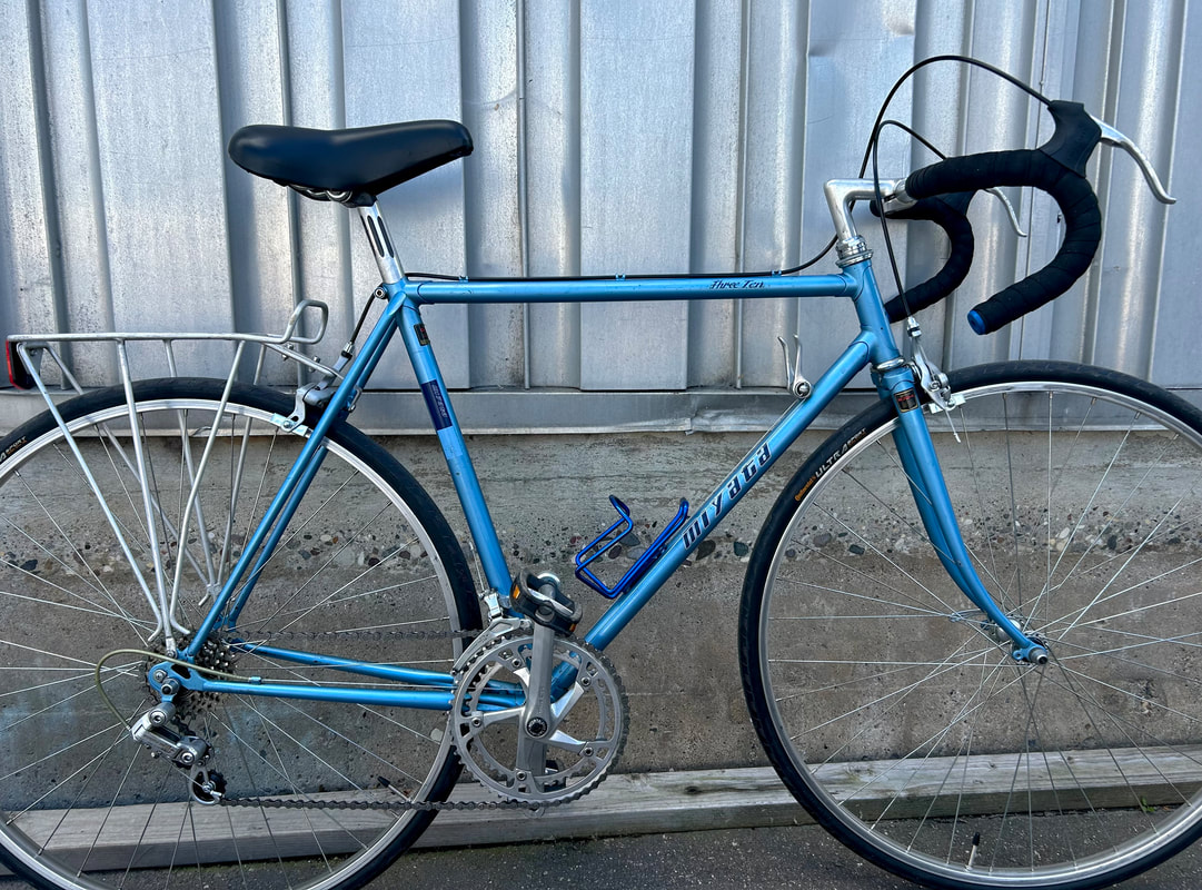 a blue miyata bicycle